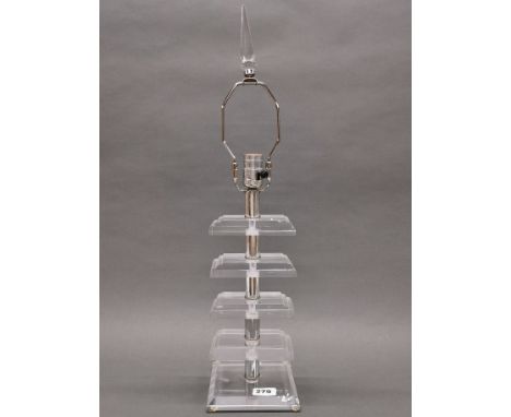 An unusual stepped lucite table lamp base, H. 66cm.