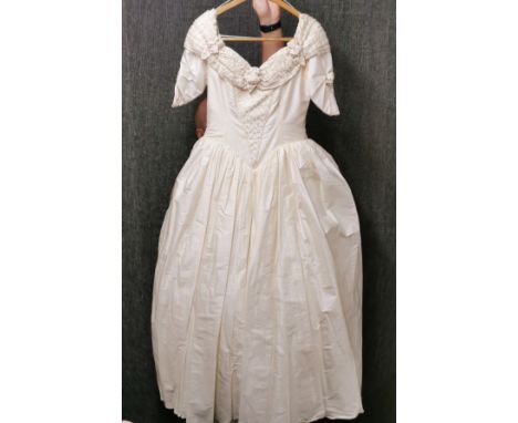 A vintage cream silk wedding dress.