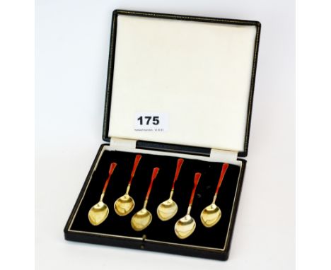 A lovely set of six hallmarked silver and enamel gilt bowl coffee spoons.
