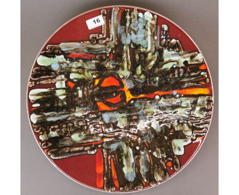 A large Poole Pottery charger, Dia. 41cm.