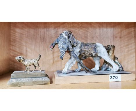 A cold painted metal strike lighter (no striker) L. 26cm, together with a gilt brass model of a dog.