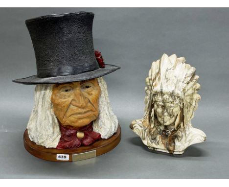 A large composition bust of native American chief Dan George, H. 45cm, together with a further ceramic native American bust.