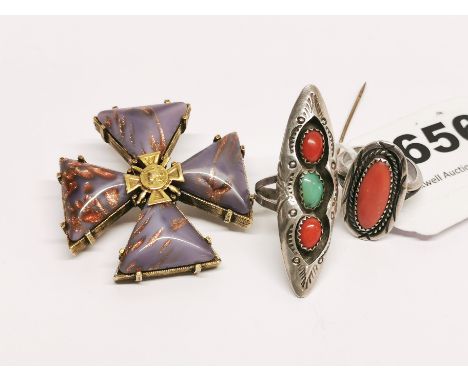 Two sterling silver native American Indian rings and a vintage brooch.