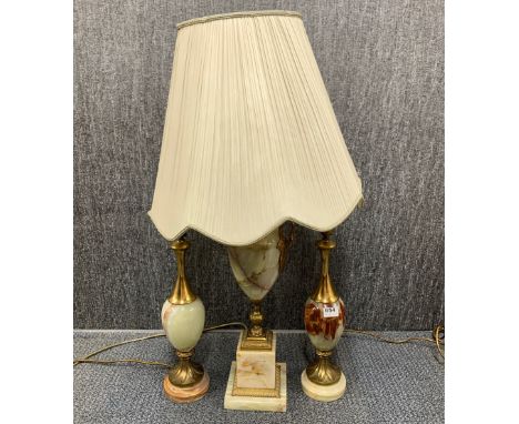 A group of three gilt brass and onyx vintage table lamps, tallest with shade H. 88cm.