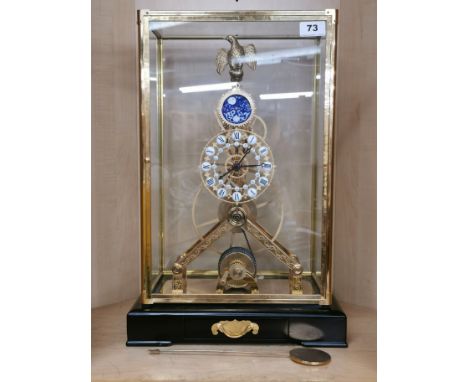 A superb gilt brass cased moonphase skeleton clock, H. 51cm. W. 34cm.