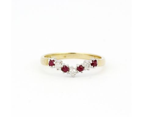 A 9ct yellow gold ruby and diamond set wishbone ring, (L).