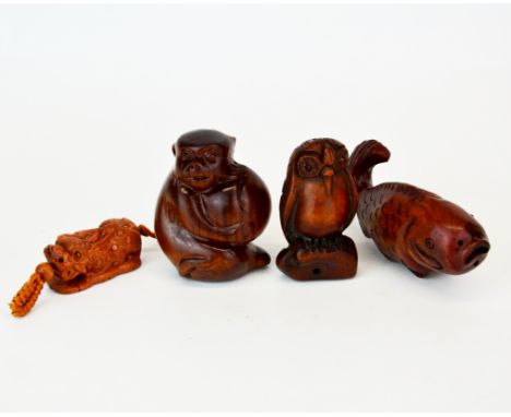 Three carved wooden Netsuke and one Okimono, monkey H. 6cm.