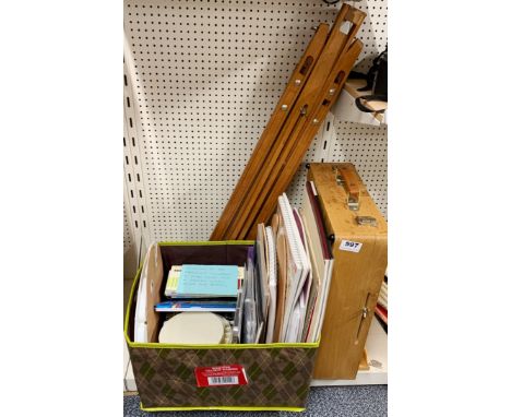 A large quantity of artists materials with easel and a further portable easel.