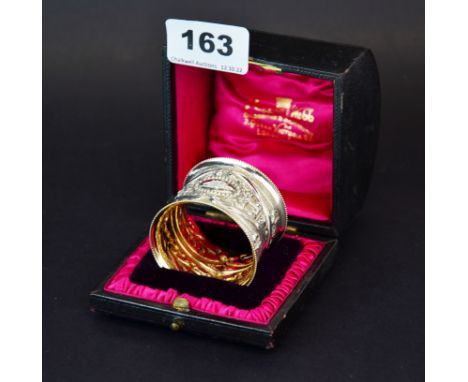 A boxed Mappin &amp; Webb silver napkin ring.