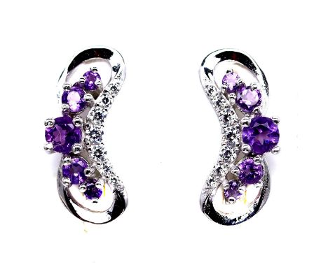 A pair of 925 silver earrings set with amethyst and white stones, L. 1.9cm.