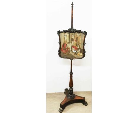 An early 19th C rosewood pole screen with fine tapestry panel, H. 146cm.