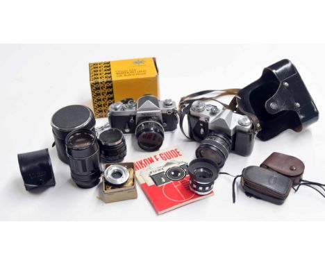 Nikon F2 camera with instruction guide,&nbsp;together with a Zenit-B camera in carry case, and selection of camera accessorie