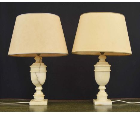 Pair of Italian veined onyx baluster table lamps with oval shades, the lamp bases 14.5" high including fitting, 21.5" high ov
