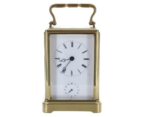 Small carriage clock timepiece with alarm sounding on a bell, within a one-piece style brass case, 5.75" high (key) 