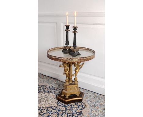A Restauration ormolu and later mounted gueridon, circa 1820 and later adapted   A Restauration ormolu and later mounted guer