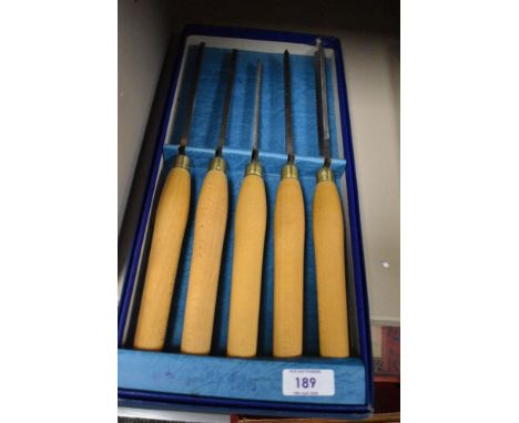 A five piece woodturning chisel set.