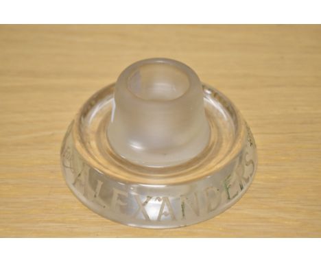 A vintage glass advertising ashtray/vesta, branded for Alexanders mineral water, of local interest to Kendal.