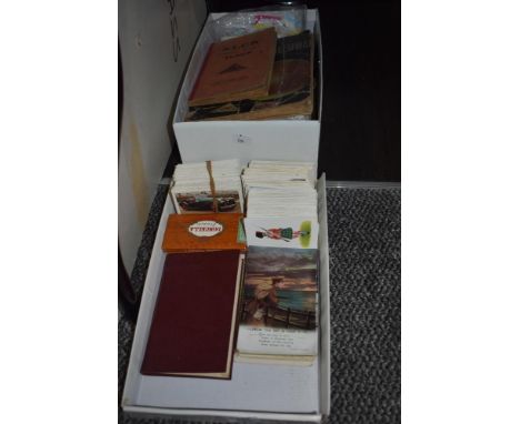 A collection of Bamforth WW1 postcards, a small quantity of assorted vintage stamp albums with loose stamps and cigarette car