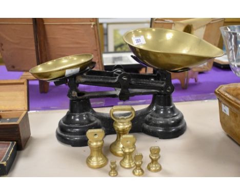 A vintage set of Librasio kitchen scales with brass pans and weights.