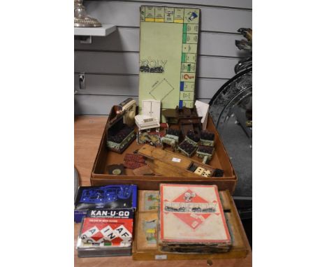 A collection of assorted vintage children's toys and games including Victorian style dolls house furniture, Monopoly, boxed b