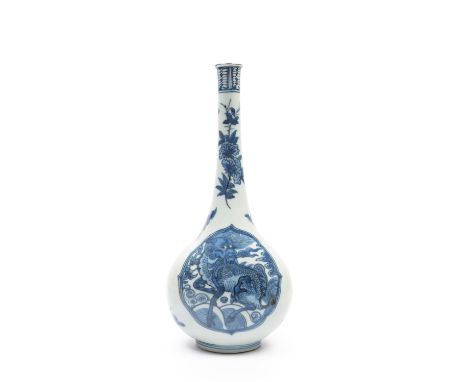 h cm 30The compressed globular body is well painted in underglaze blue with two lobed panels surrounded by three-pointed clou