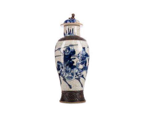 CHINESE LIDDED VASE,late 19th century, painted with mounted combat scene against crackled ground between bronzed bands, the l