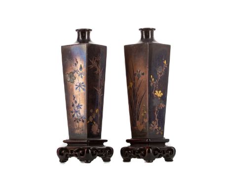 SMALL PAIR OF JAPANESE SQUARE SECTION TAPERING VASES,inlaid with prunus, bamboo and foliage in various metals, 11cm high, on 