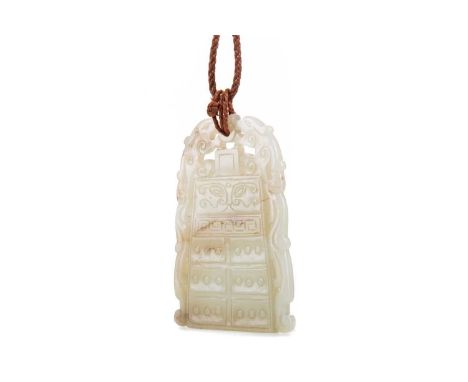 CHINESE MUTTON JADE PENDANT,carved as a temple bell bearing taotie mask, key fret and archaistic motifs flanked by twin pierc