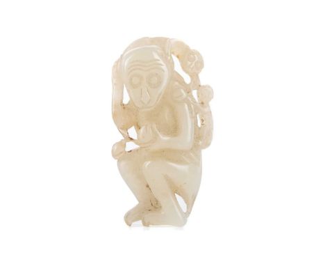 CHINESE MUTTON JADE CARVING OF A MONKEY,modelled holding a fruit with young on its back, 5cm highSome general surface wear, i