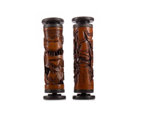 TWO CHINESE BAMBOO INCENSE BURNERS,the first carved with ducks amongst lotus blooms, the second with figural mountain landsca