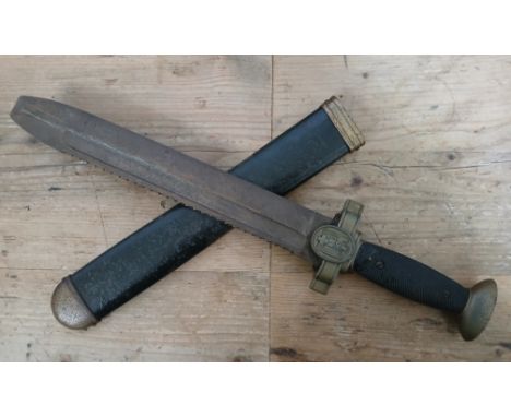 A German third Reich WWII Red Cross hewer, 26.5cm saw back blade, black bakelite grip, metal scabbard, total length 41cm.