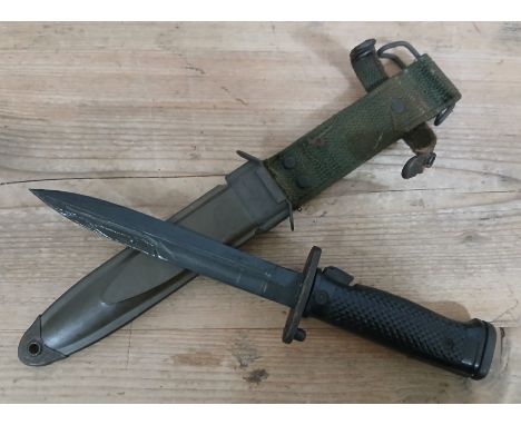 A United States M5 bayonet and scabbard, total length 33cm.