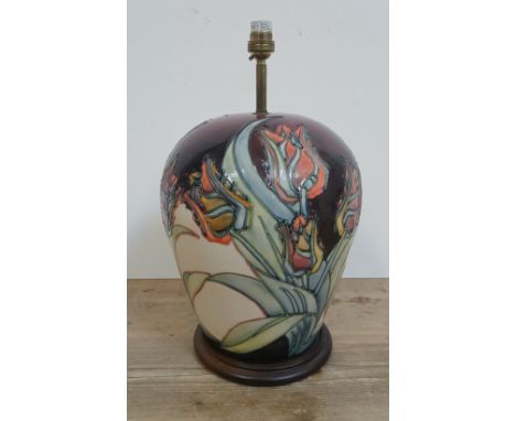 A large Moorcroft pottery table lamp decorated in Tulips pattern, height 42cm (including fitting), comes with shade, not pict