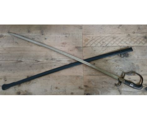 An Imperial German Field Artillery officer's sword, 81cm curved blade, wire bound black bakelite handle, metal scabbard, tota