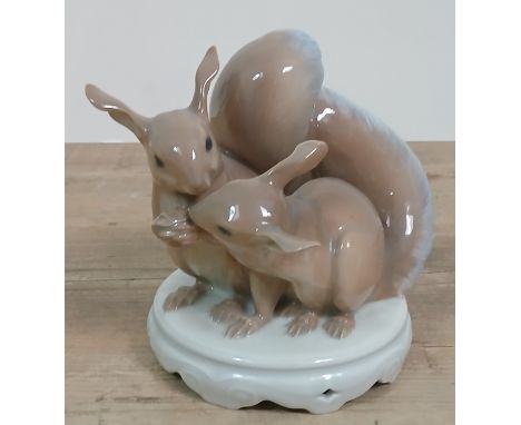 A Royal Copenhagen model depicting two squirrels and one nut, height 18cm.