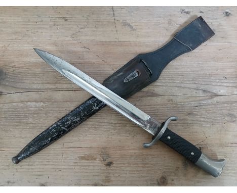 A German Third Reich Fireman's Parade dagger by Carl Henkel, blade length 24.5cm, metal scabbard and associated leather frog,
