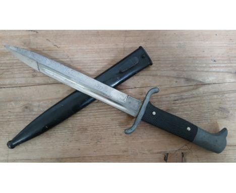A German Third Reich Fireman's Parade dagger,  unidentified maker's mark to blade, length 20cm, metal scabbard and associated