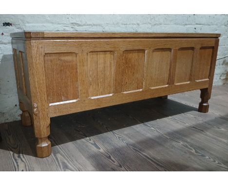Robert 'Mouseman' Thompson of Kilburn, an English panelled and adzed oak blanket box, length 104cm, mouse signature to left f