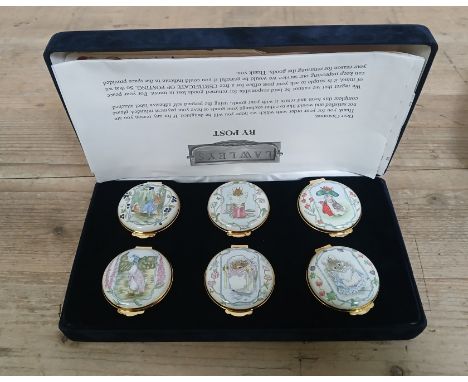 Royal Doulton, a cased set of six Beatrix Potter Peter Rabbit and Friends circular enamel pill boxes.&nbsp;Condition - very g