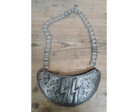 A German third Recih SS gorget breastplate with chain.Note:- We believe this item to be genuine from the WW2 period.