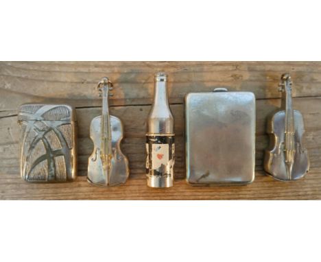 A group of four  vestas including two cellos together with a. novelty lighter modelled as a bottle. 