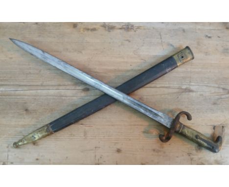 A German 1871 pattern bayonet and scabbard.
