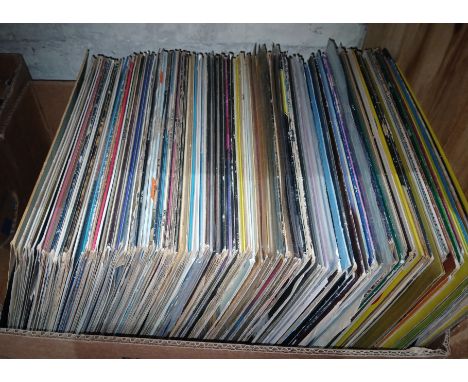 A box of over 100 assorted rock and pop LP's from the 60's and 70's to include Elvis Presley, Roy Orbison, Abba, Bee Gees, Jo