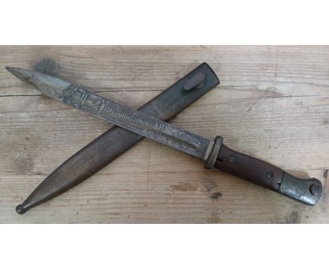 A German Third Reich WWII Wafen SS 7th Panzer Division K98 bayonet by Mundlos, 25cm etched blade, wooden grip, metal scabbard