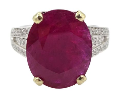 18ct white gold single stone oval ruby, with split diamond set shoulders, hallmarked, ruby approx 9.80 carat