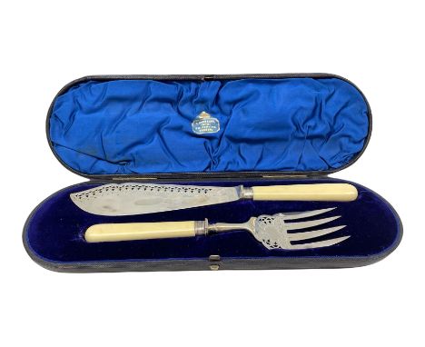 Pair of Victorian silver bladed fish servers with engraved and pierced decoration and bone handles, cased,  Sheffield 1889, M