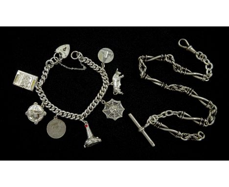 Silver charm bracelet charms including lighthouse, spider's web, passport and bull and a silver Victorian fancy link Albert w