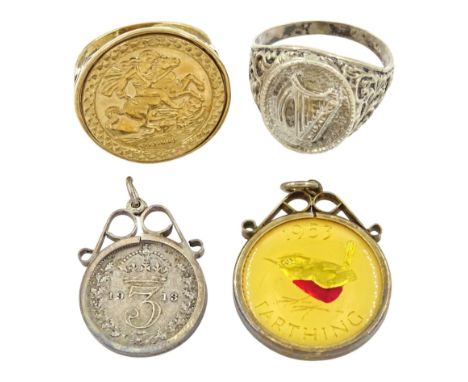 9ct gold St George medallion ring, silver harp ring, silver mounted 1953 Farthing pendant and one other pendant