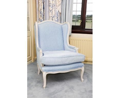 **PLEASE NOTE COLLECTION OF THIS LOT WILL BE FROM BISHTON HALL STAFFORDSHIRE**A Louis XVI style painted wood wing armchair, m