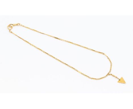 A continental yellow gold fancy-link watch chain, stamped 18k, suspending a 14k gold trowel, stamped 585, approx 18" / 46cm, 